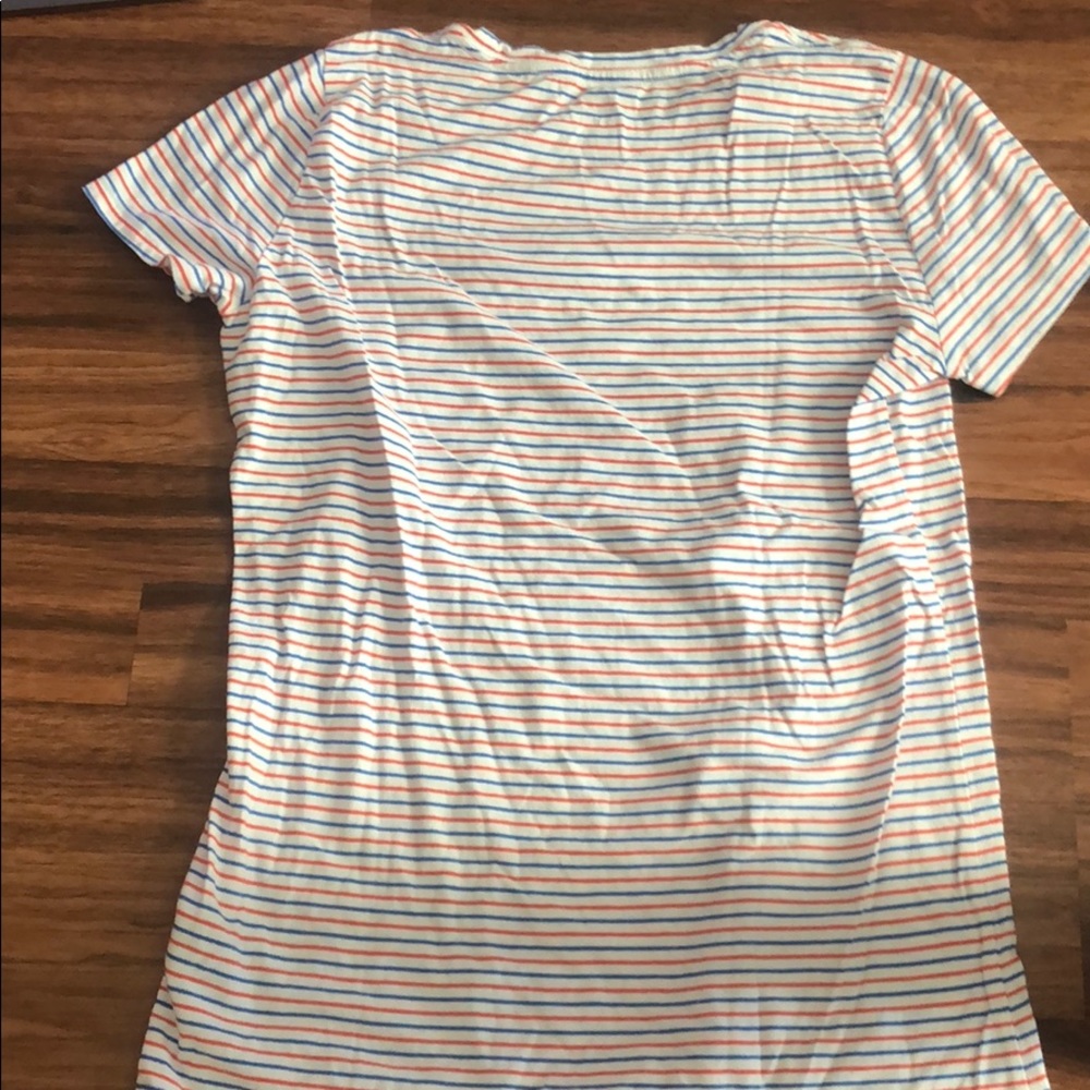 A long White Blue and Red shirt